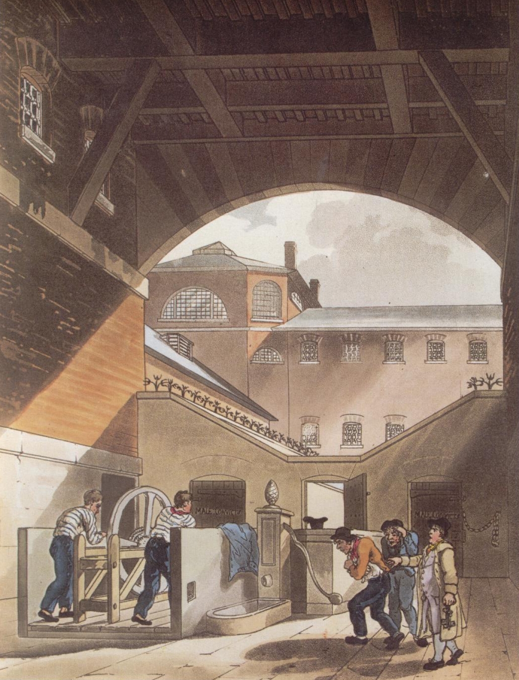 A prison courtyard.  Two prisoners in striped uniforms can be seen turning a large engine, while two further men, incoming prisoners in street clothes, are directed towards a water pump by a man with a bunch of keys in one hand.