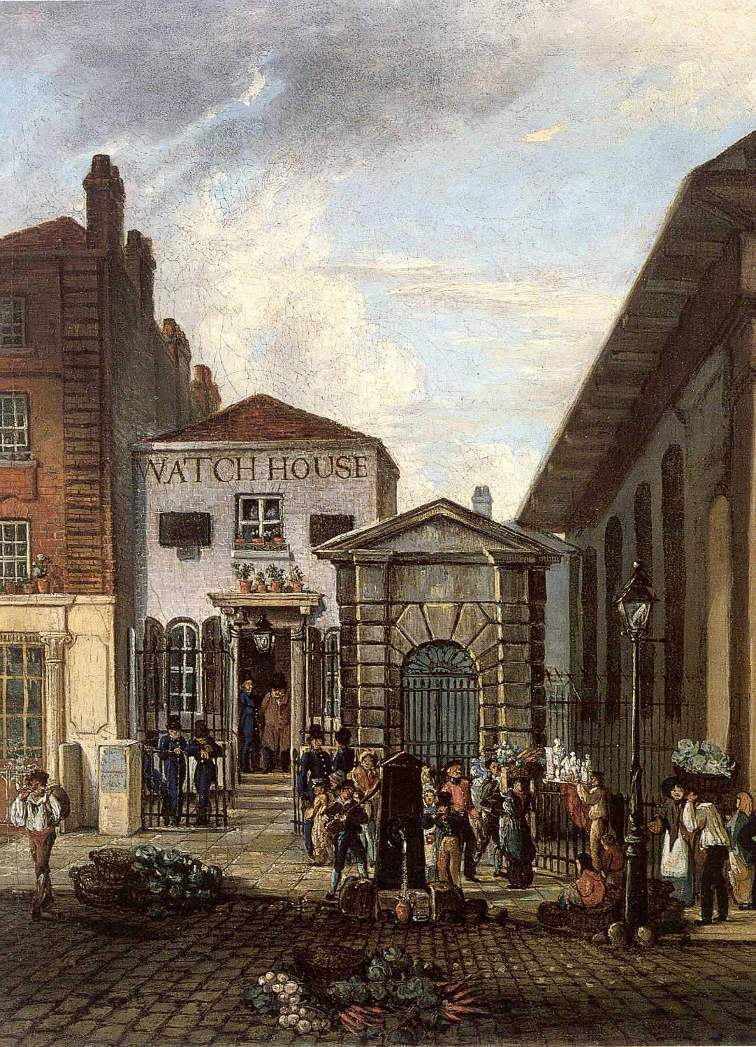 Covent Garden watch house, located next to the church of St. Paul Covent Garden.  A two storey white building with 'Watch House' painted on its upper floor is shown with a lively street scene in the foreground