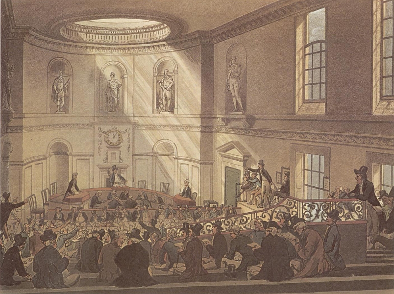 A large room, light shining down from a round sky-light; the walls are set with three classical statues, and one of a man in 18th century costume.  The main area in the centre is taken up with a circle of desks with three men around the outside, and a group of eight clerks busily writing in the middle.  In the foreground of the image rows of men can be seen sitting on serried benches, some gesticulating.