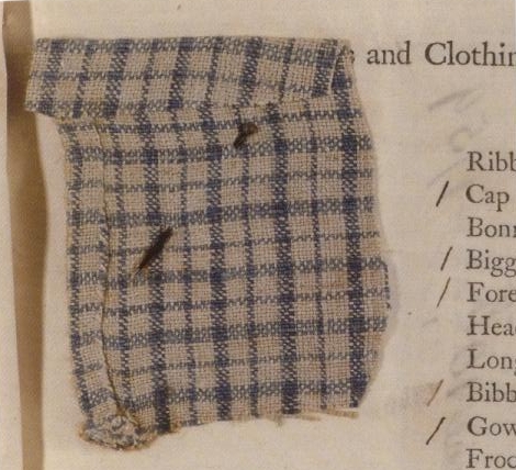 A fragment of linen or cotton woven in a blue and white check pattern, of that sort that might have been used to make a gown for the parish poor.