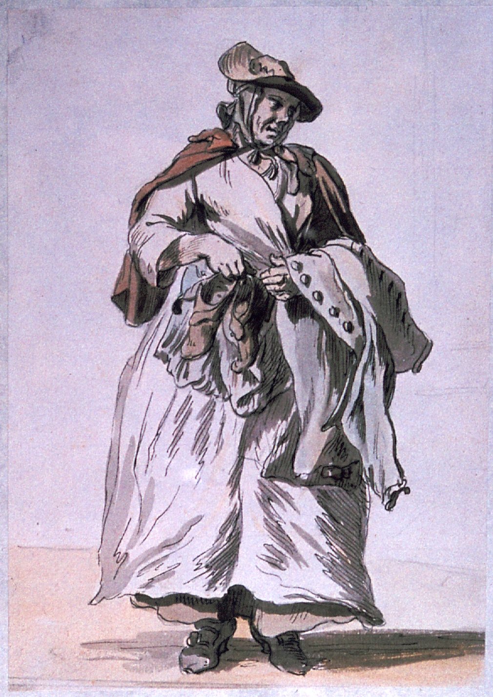 An older women with a pair of shoes in one hand, and a man's jacket over one arm