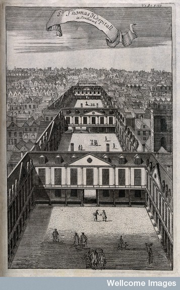 A bird's eye view of St Thomas's Hospital, looking east, showing its three courtyards