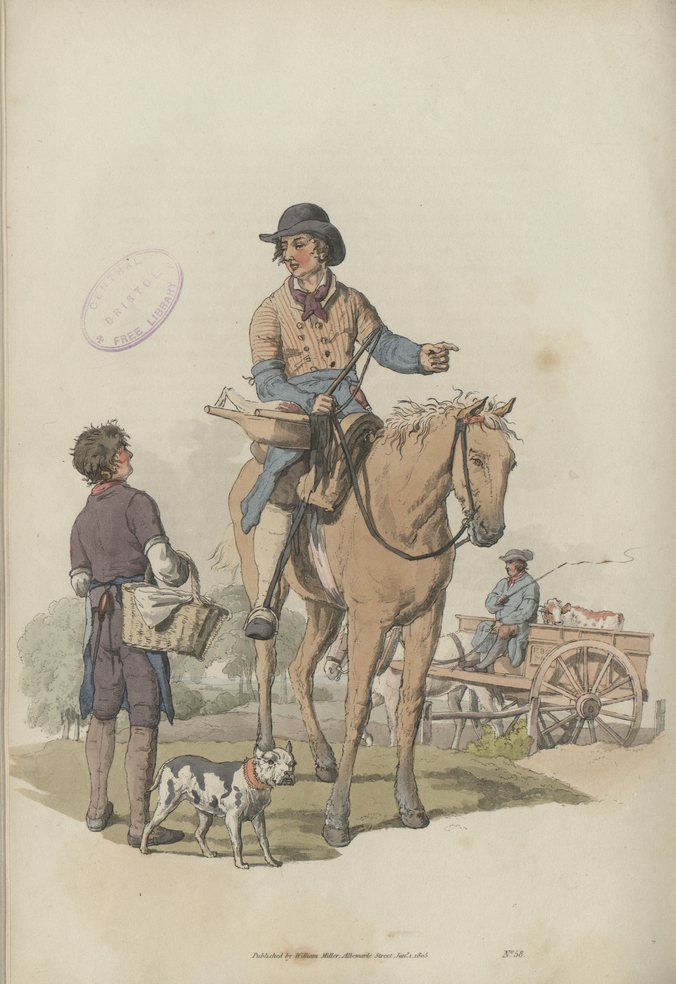 A man on a horse gives directions to a boy standing